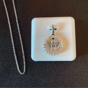 Gorgeous Moissanite Gemstone Silver Angel pendant. 16 adjustable silver chain.